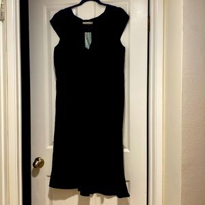 Cute cut loose liner black dress new with tags never worn